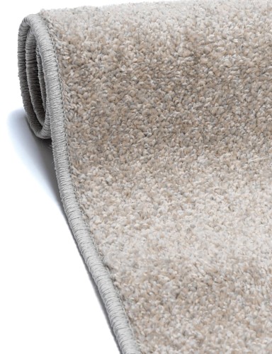 Bok dywanu Velutto minimalistyczny brązowy