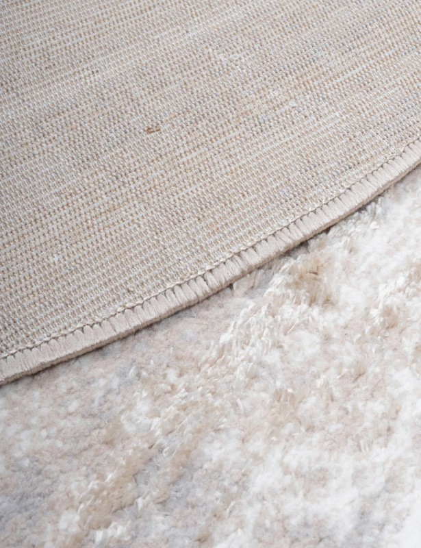 Spód dywanu okrągłego nowoczesnego Salamanca przecierka beżowa