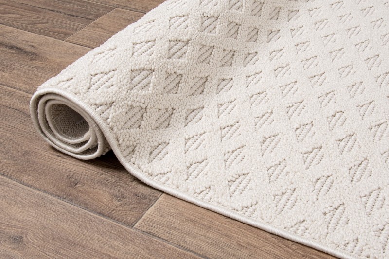 Bok kremowego dywanu boho Milano 027