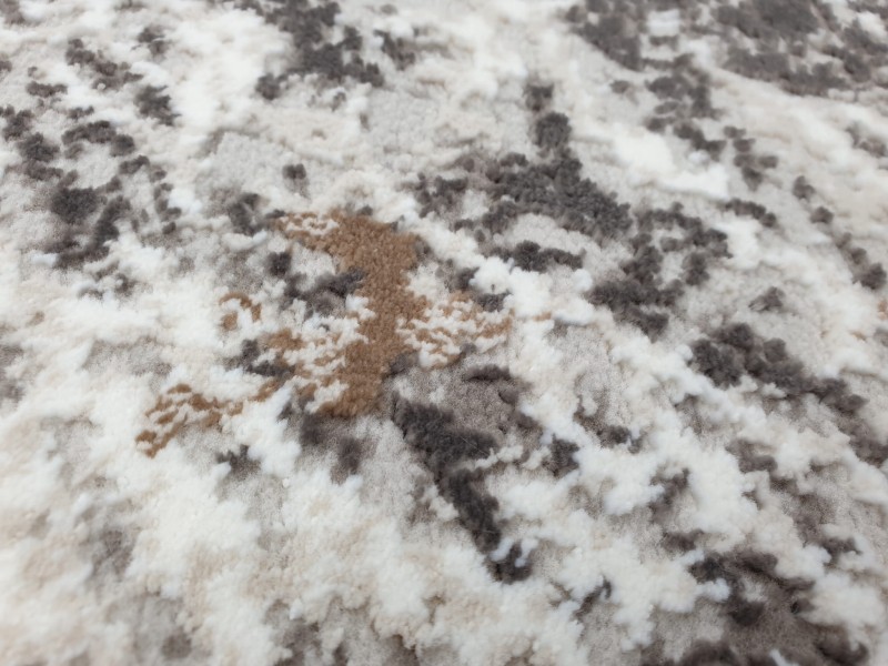 Zbliżenie runa dywanu nowoczesnego Exclusive 101 beżowo-złotego