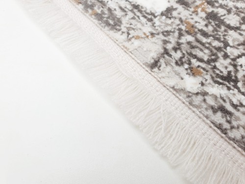 Wykończenie frędzlami dywanu Exclusive 101 beżowo-złotego