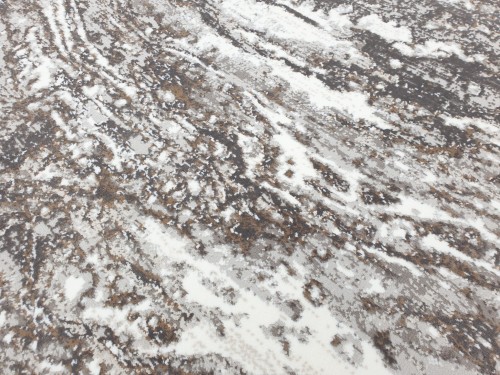 Zbliżenie runa dywanu wzór marmur Exclusive 100 beżowo-złotego