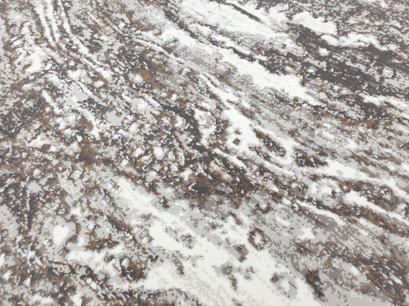 Zbliżenie runa dywanu wzór marmur Exclusive 100 beżowo-złotego