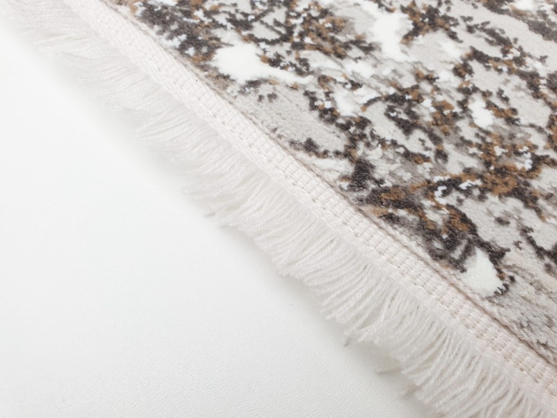 Wykończenie frędzlami dywanu nowoczesnego Exclusive 100 beżowo-złotego