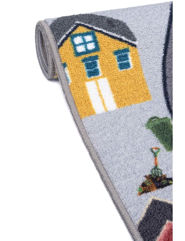 Szary dywan dziecięcy antypoślizgowy Ares ulice  zwinięty w rulon