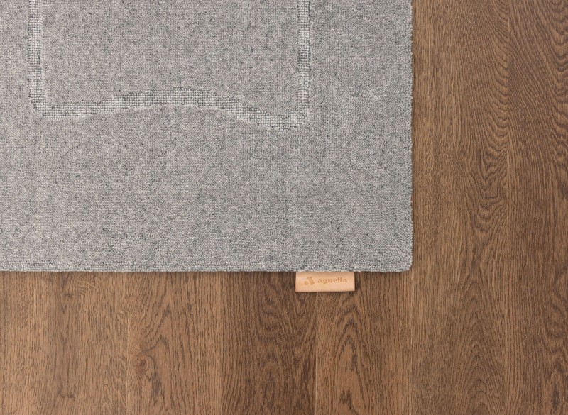 Szary dywan wełniany Agnella Ladnini Morphic - róg