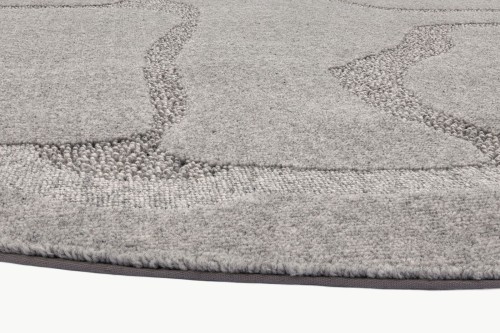 Szary wełniany dywan koło Agnella Ladnini Morphic Organica - brzeg