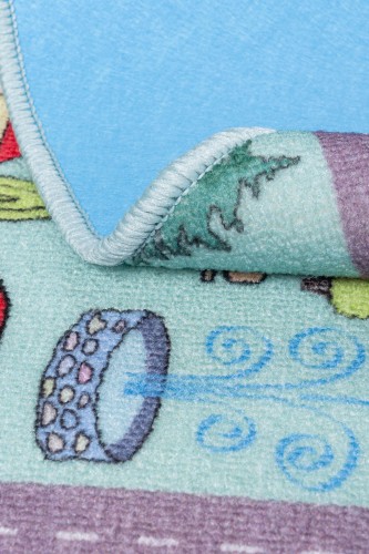 Dywan okrągły Stella Ulice morski zwinięty dywanywitek.JPG