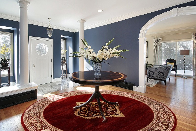 dywan okrągły wełniany tradycyjny Agnella Isfahan Uriasz rubin w salonie