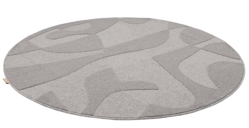 Okrągły szary dywan wełniany Agnella Ladnini Morphic Botanica - rzut z ukosa