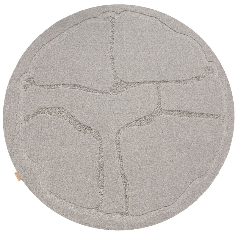 Szary wełniany dywan koło Agnella Ladnini Morphic Organica