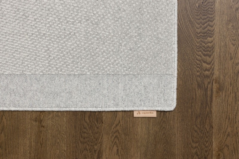 Dywan wełniany Agnella Noble Milo szary - róg