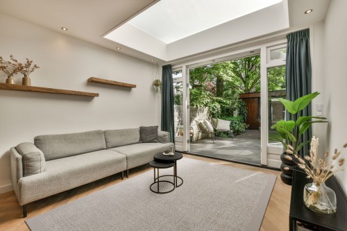 Dywan nowoczesny wełniany Agnella Tempo Edyl szary w salonie