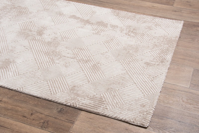 Rzut z boku na beżowy dywan art deco Anett E800AC