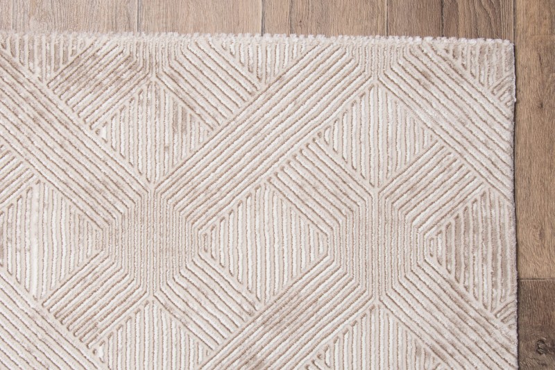 Boki beżowego dywanu art deco Anett E800AC