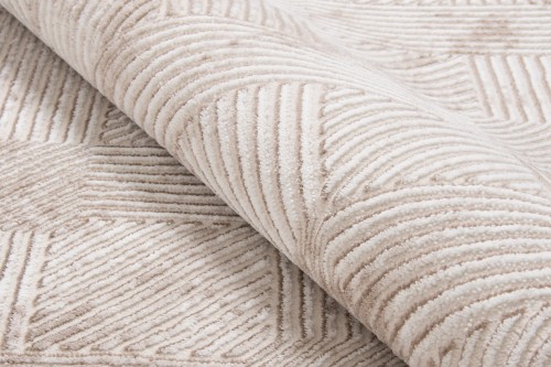 Zbliżenie runa beżowego dywanu art deco Anett E800AC