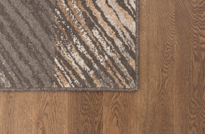 Brzegi dywanu Agnella Ballata Vixi brąz na podłodze venge