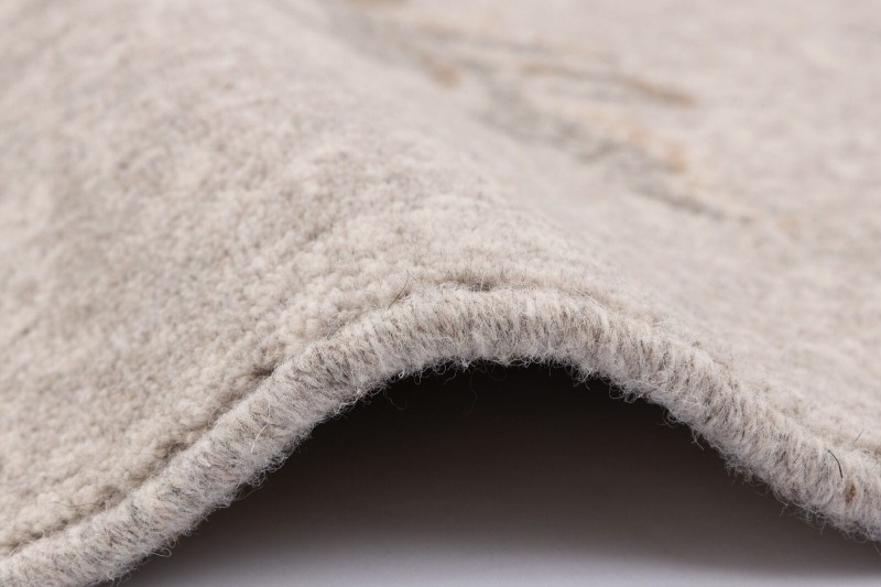 Dywan okrągły wełniany Agnella Ballata Jira szary obszycie.jpg