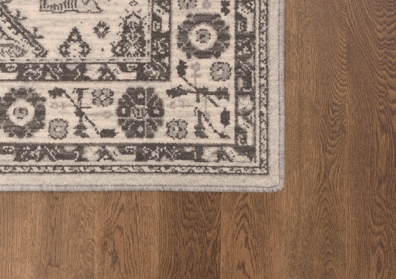 Brzegi dywanu wełnianego Agnella Ballata Emivo w kolorze szarym