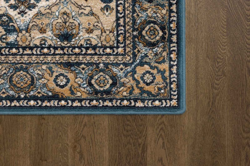 Róg dywanu Dywan wełniany Agnella Isfahan Forenza kolor szmaragd_emerald w rozmiarze 1,33x1,8 m