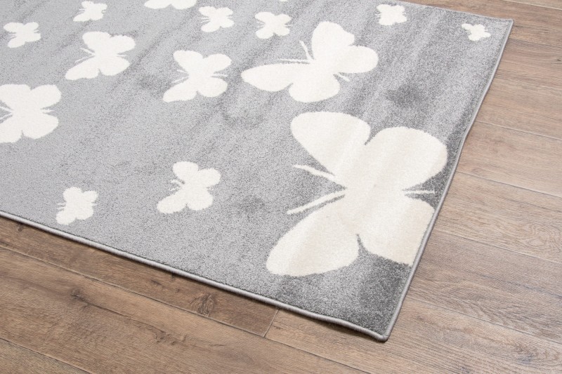 Dywan dla dzieci Weltom Motylki szary na podłodze