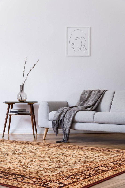 Dywan wełniany Agnella Isfahan Klimene kremowy w nowoczesnym salonie