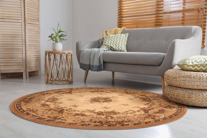 Dywan wełniany okrągły Agnella Isfahan Dafne kolor sahara rozmiar 2x2 m w salonie