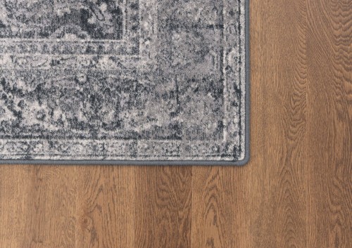 Brzegi dywanu Agnella Isfahan Okutan w kolorze szarym