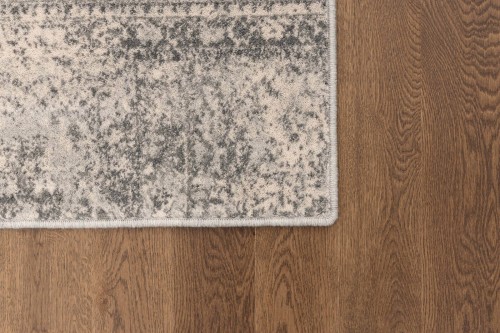 Brzegi dywanu Agnella Isfahan M Korist kolor grey_popielaty w nowoczesnym salonie