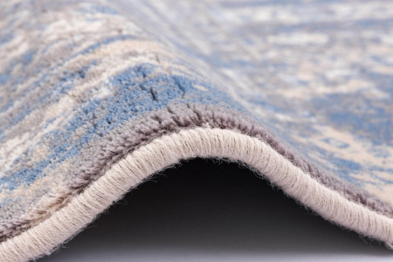 Obszycie wełniane dywanu  Agnella Isfahan Grawe w kolorze beżowym