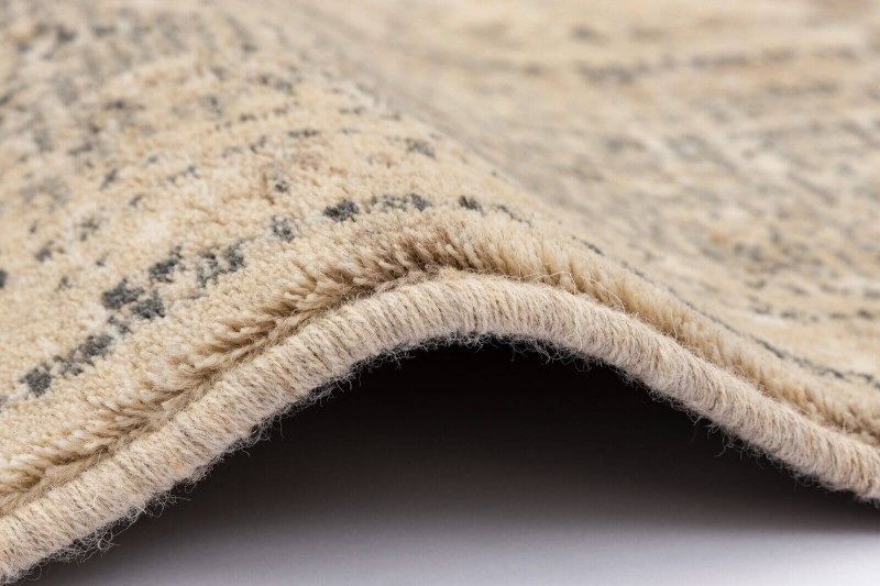 Obszycie wełniane dywanu Agnella Isfahan Fabio kolor len