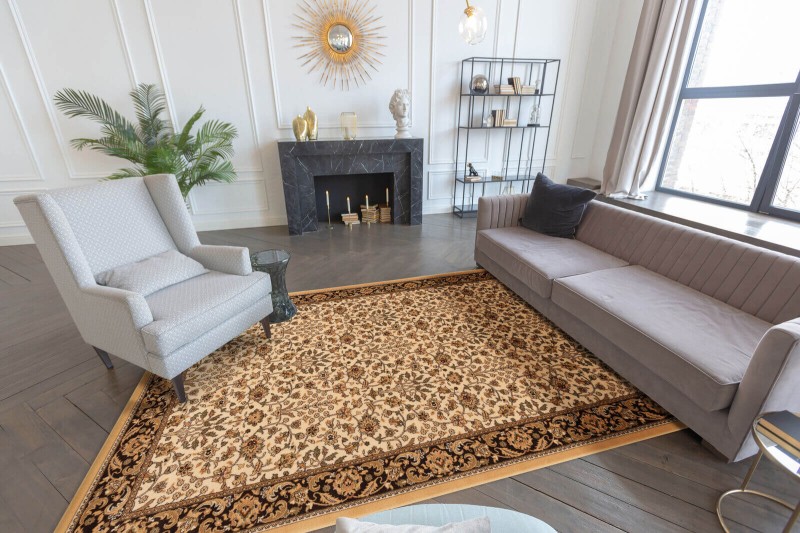Dywan wełniany Agnella Isfahan Itamar kremowy w salonie w stylu glamour