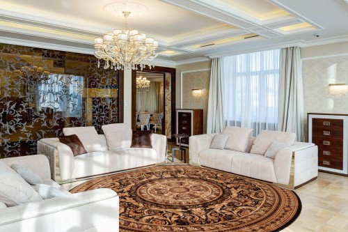 Dywan wełniany okrągły Agnella Agnus Egon czarny w salonie w stylu glamour