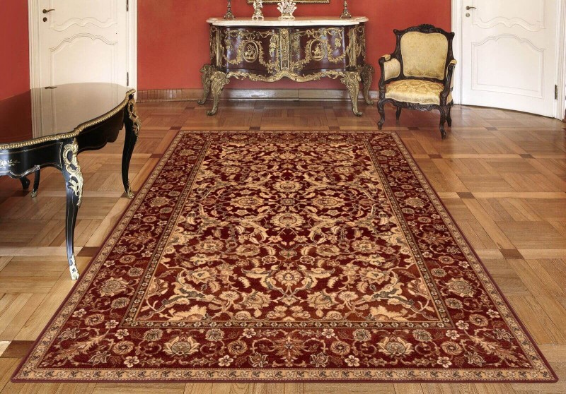 Dywan wełniany Agnella Agnus Stolnik rubin w klasycznym salonie w pałacu