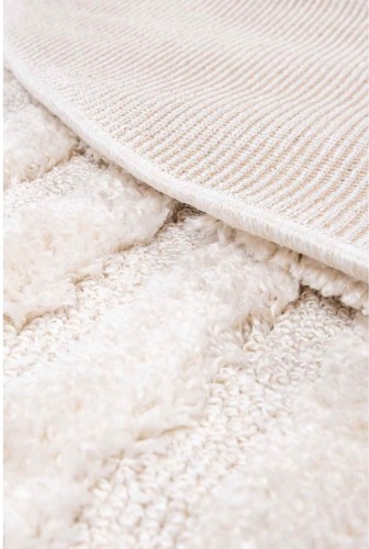 Spód i wzór 3d kremowego dywanu okrągłego shaggy 3d Pisa fala