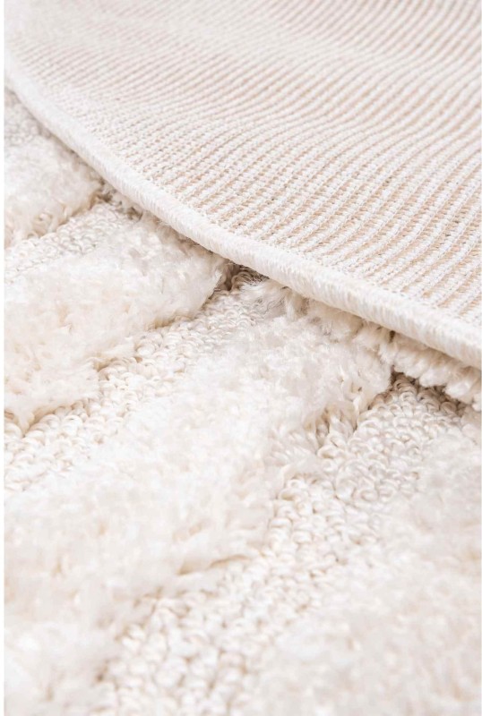 Spód i wzór 3d kremowego dywanu okrągłego shaggy 3d Pisa fala