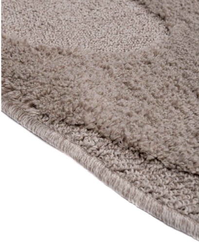 Bok beżowego dywanu okrągłego shaggy 3d Pisa fala
