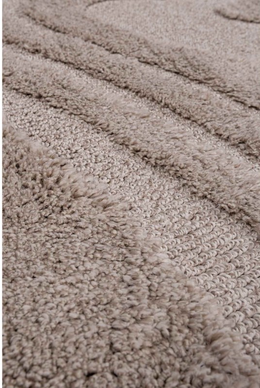 Wzór beżowego dywanu okrągłego shaggy 3d Pisa fala