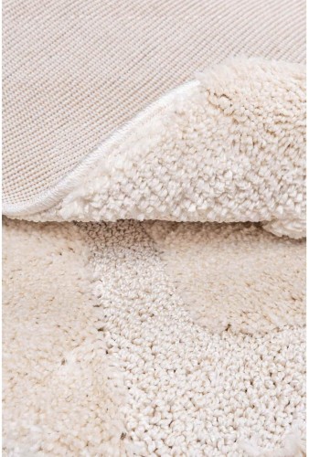 Spód kremowego dywanu okrągłego shaggy geometria 3d Pisa romby