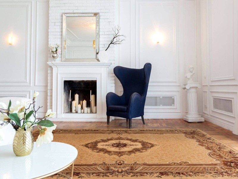 Dywan wełniany Agnella Agnus Nefretete bursztyn w salonie w stylu modern classic