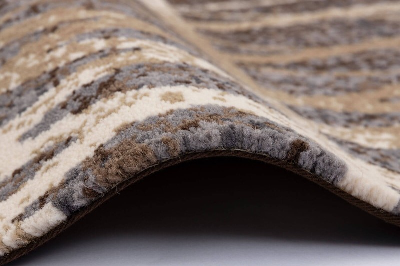 Dywan wełniany Agnella Tempo Tange niebieski - brzeg