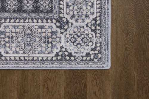 Dywan wełniany Agnella Isfahan Nour jasny niebieski - zdjęcie rogu dywanu