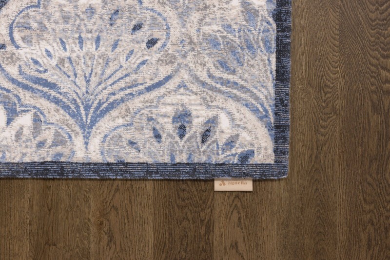 Dywan wełniany Agnella Regius Maisie niebieski - róg dywanu