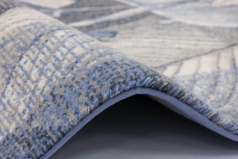 Dywan wełniany Agnella Regius Marceline niebieski - brzeg