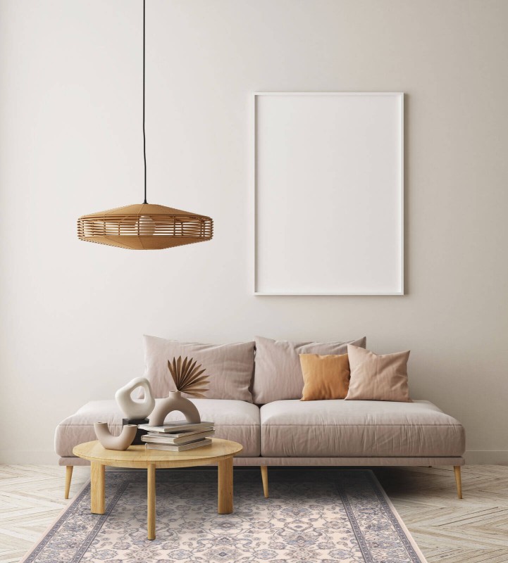 Dywan wełniany klasyczny Agnella Isfahan Kantabria kolor alabastrowy w owoczesnym salonie z jasną kanapą