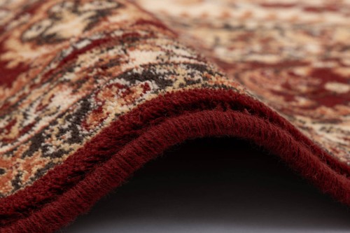 Obszycie wełniane dywanu Agnella Isfahan Almas kolor rubin