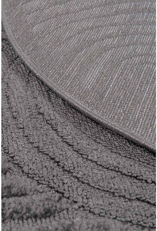 Spód szarego okrągłego dywanu nowoczesnego Chiara fala