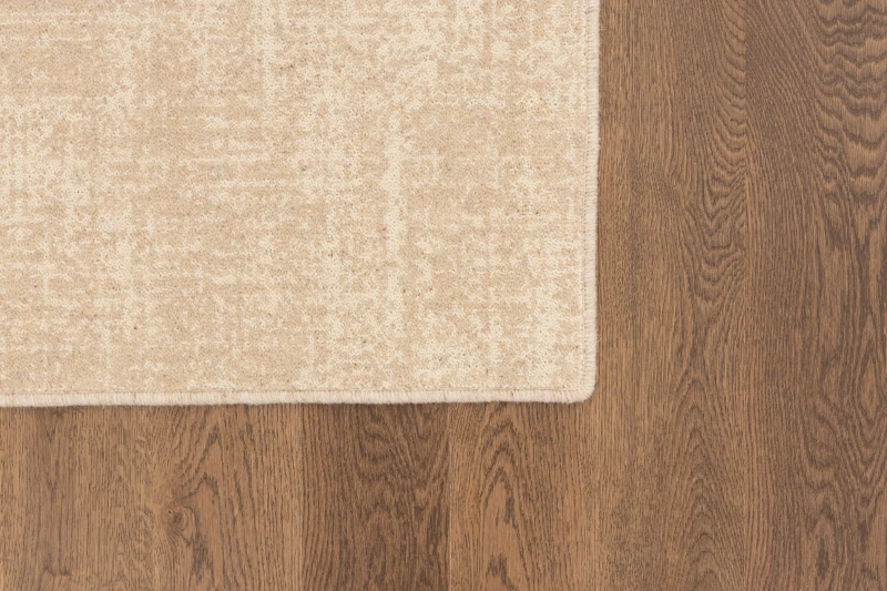 Dywan wełniany nowoczesny Agnella Ballata Alova w kolorze beżowym - róg dywanu