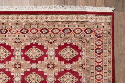 Frędzle i brzeg dywanu orientalnego pakistańskiego Jaldar 122x182 cm