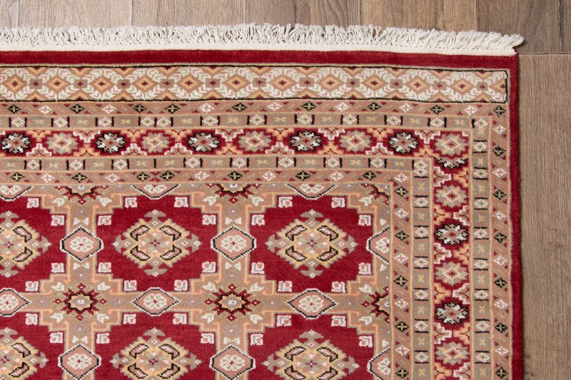 Frędzle i brzeg dywanu orientalnego pakistańskiego Jaldar 122x182 cm